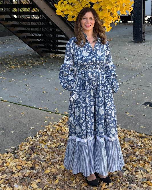 Kaitlyn Dress – hand block-printed blue and white floral cotton maxi dress with striped tiered hem and tie waist, full-length front view